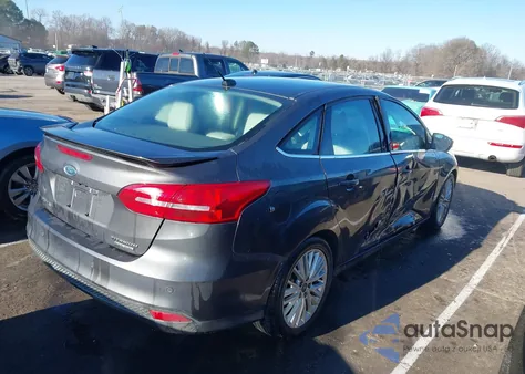2015 Ford Focus Titanium из США, поврежденный, VIN 1FADP3J29FL333244